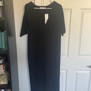 Calvin Klein women's black short sleeve v-neck midi dress in size Medium